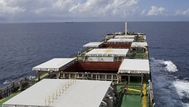Bulk cargo ship underway with opened hatch covers (picture)