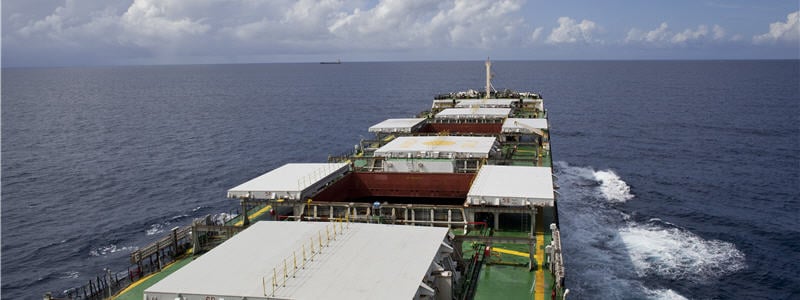 Bulk cargo ship underway with opened hatch covers (picture)
