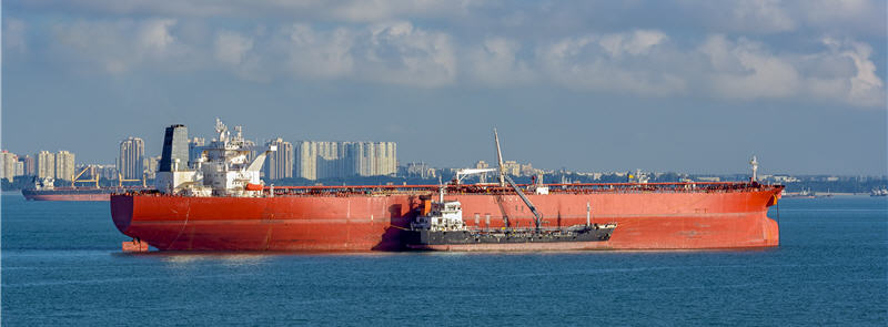 Refuelling or bunkering in marine terms is carried out using a small tanker to pump the bunker fuel into the bigger ship (photo)