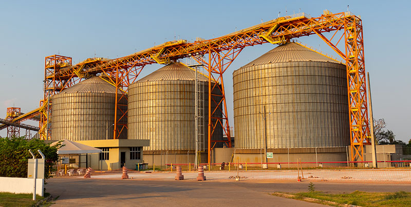 Three large soybean storage silos located at the Port of Cargill, in Santarem, awaiting transport by ships (photo)
