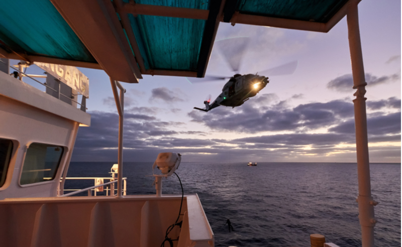 Rescue of person from ship by helicopter exercise (photo)