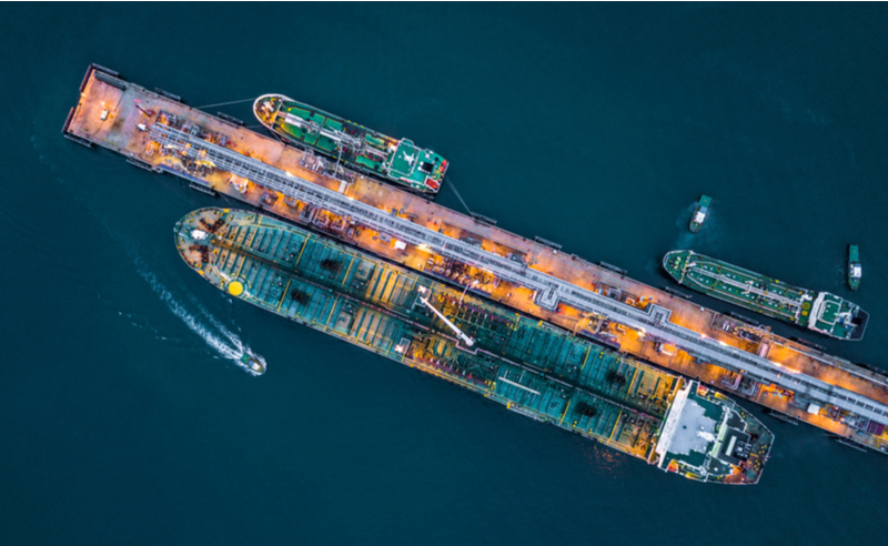 Aerial top view of oil tanker ship at the port (photo)